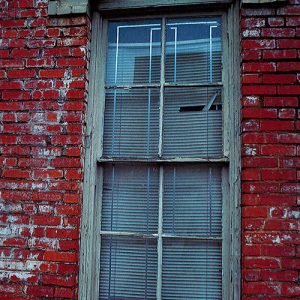 Close-up of window on brick warehouse