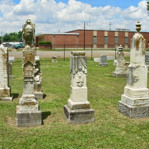 Group of tall monuments in cemetery