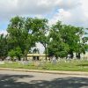 Cemetery and trees as seen from across the street