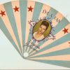 White woman on a blue and white fan with red stars "I"m a Fan Virginia Johnson"