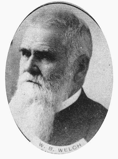 White man with long beard in suit in oval frame