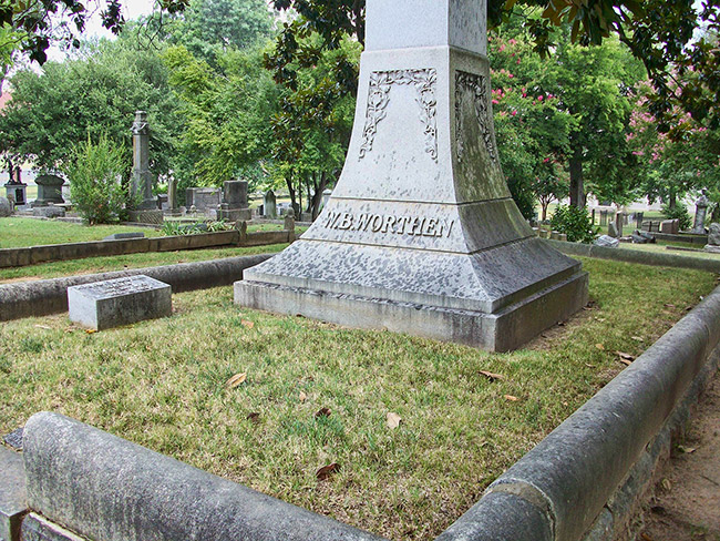 "W. B. Worthen" monument and gravestone in cemetery