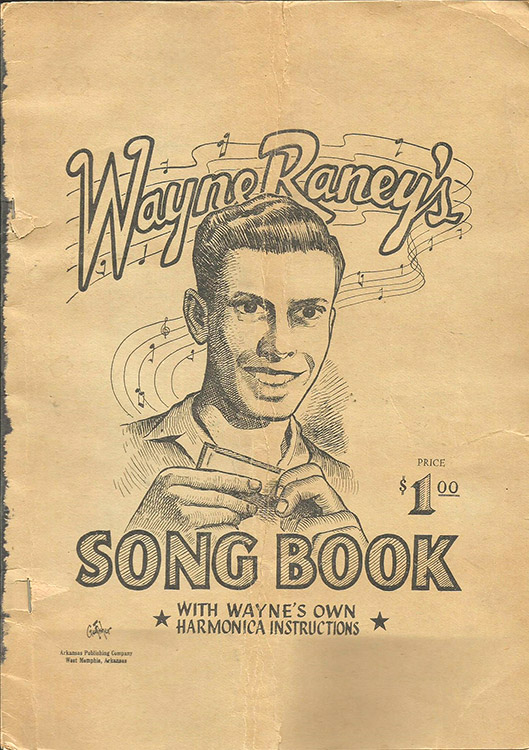 White man with harmonica and text on songbook cover