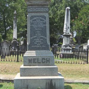 "Welch" grave monument in family plot in cemetery