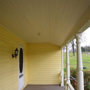 Looking toward front door on covered porch