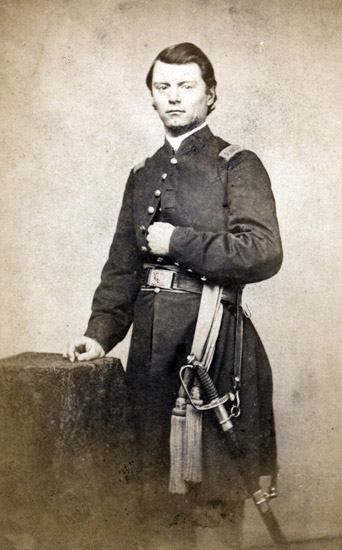White man in military uniform with sword