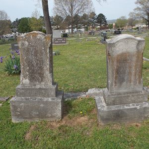 Weathered gravestones in cemetery