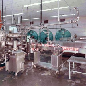 Interior of ice cream factory with packaging machine