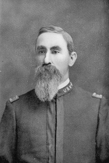 White man with long mustache and beard in military uniform