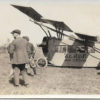 White men in hats and suits around  "Zerbe Air Sedan" flying machine