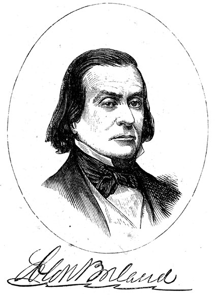 White man with long hair in suit and bow tie