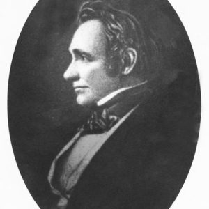 Profile view of white man with suit and cravat