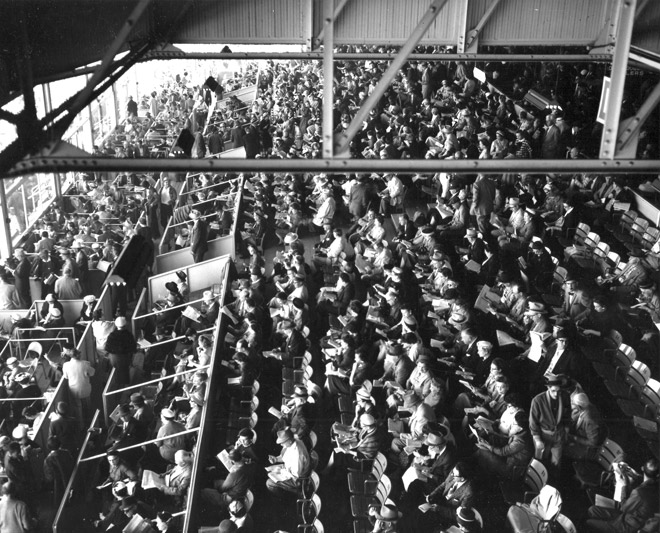 Overhead view crowd in interior stadium seating and box seats