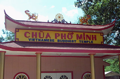 Exterior "Chua Pho Minh Vietnamese Buddhist Temple" with temple architecture with flower dragon roof ornaments