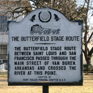 sign: "The Butterfield Stage Route: The Butterfield Stage Route between Saint Louis and San Francisco passed through the Main Street of Van Buren, Arkansas and crossed the river at this point."