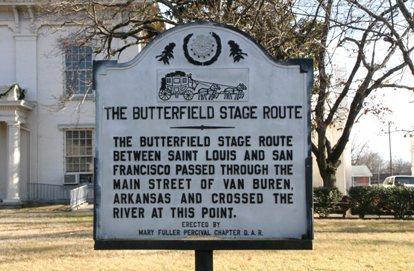 sign: "The Butterfield Stage Route: The Butterfield Stage Route between Saint Louis and San Francisco passed through the Main Street of Van Buren, Arkansas and crossed the river at this point."