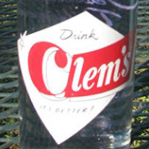 Glass soda bottle with "Clem's" logos on it