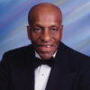 Old African-American man smiling in tuxedo
