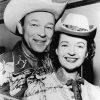 Portrait white man and woman in western wear signed "Roy Rogers, Dale Evans Rogers"