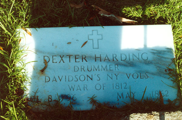 Marble grave maker with cross and engraving "Dexter Harding"