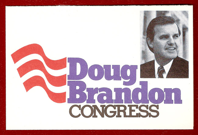 red stripes next to blue and black print "Doug Brandon Congress" with photo of white man in corner