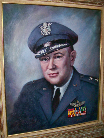 White man in military uniform with cap inside gold frame