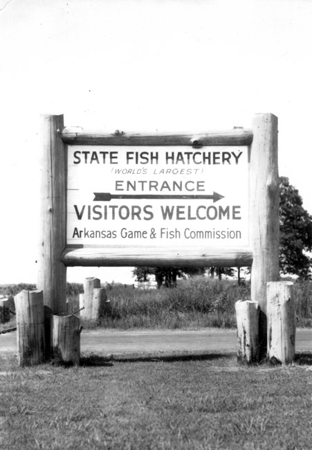 Sign with wooden posts for the "State Fish Hatchery"