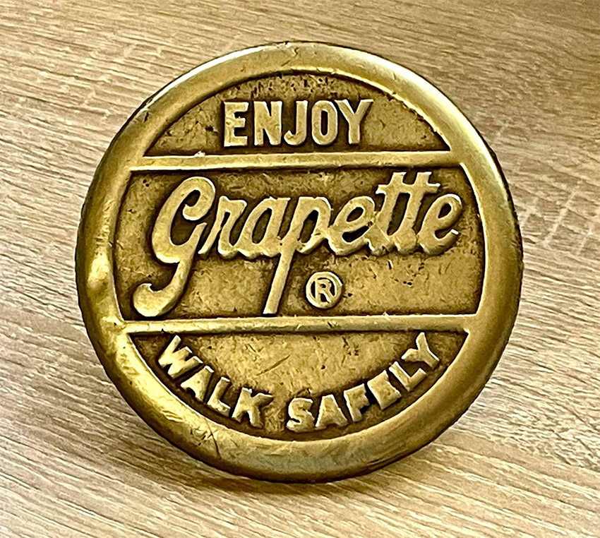 Bronze plaque "Enjoy Grapette Walk Safely