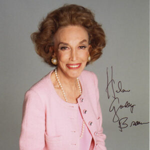 picture of white woman in pink suit with pearl necklace signed "Helen Gurley Brown"