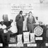 African American men play in a band in front of banner reading "Listen King Biscuit Time"