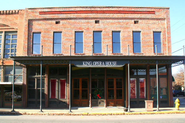 two-story brick building labeled, "King Opera House"
