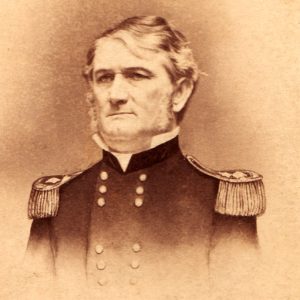 white man with sideburns in military regalia