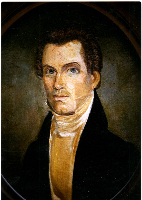 White man in black suit jacket cravat with long neck large eyes short receding brown hair with curls