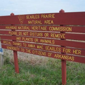 "Searles Prairie Natural Area Arkansas Natural Heritage Commission" sign on prairie