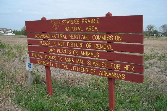 "Searles Prairie Natural Area Arkansas Natural Heritage Commission" sign on prairie