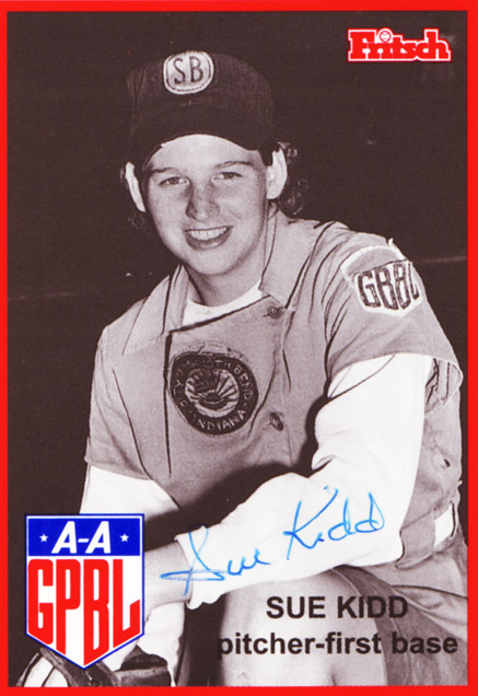 Young white woman in baseball uniform with cap and glove inside red border with text and shield logo signed "Sue Kidd"