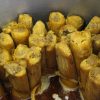 tamales upright steaming in a pot
