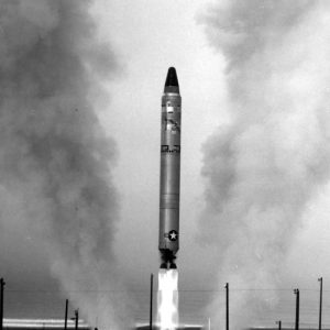 U.S. Air Force rocket leaving its platform with exhaust fire spewing out