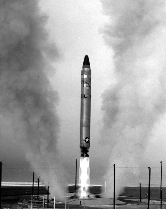 U.S. Air Force rocket leaving its platform with exhaust fire spewing out