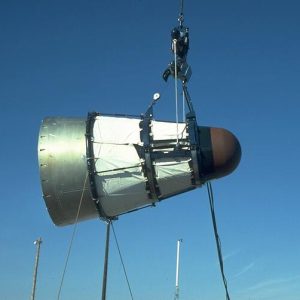 Cone shaped rocket nose on a crane