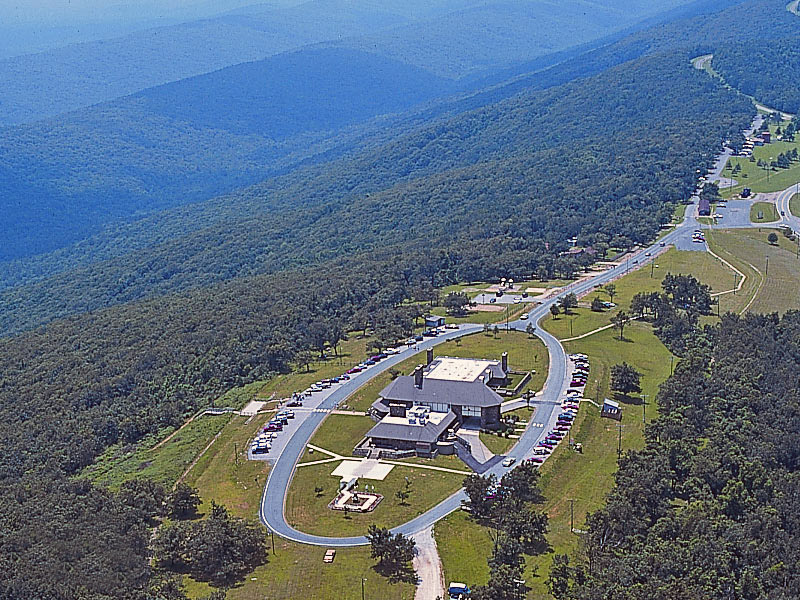 Aerial view mountain geography state park visitor center with surrounding road cars pedestrians