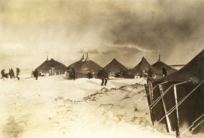 Soldiers and tents on snow