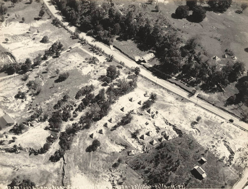 Aerial view of tents alongside road