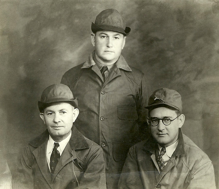 Portrait of three white man in hunting caps