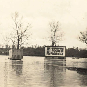 Highway and road signs submerged by flood waters
