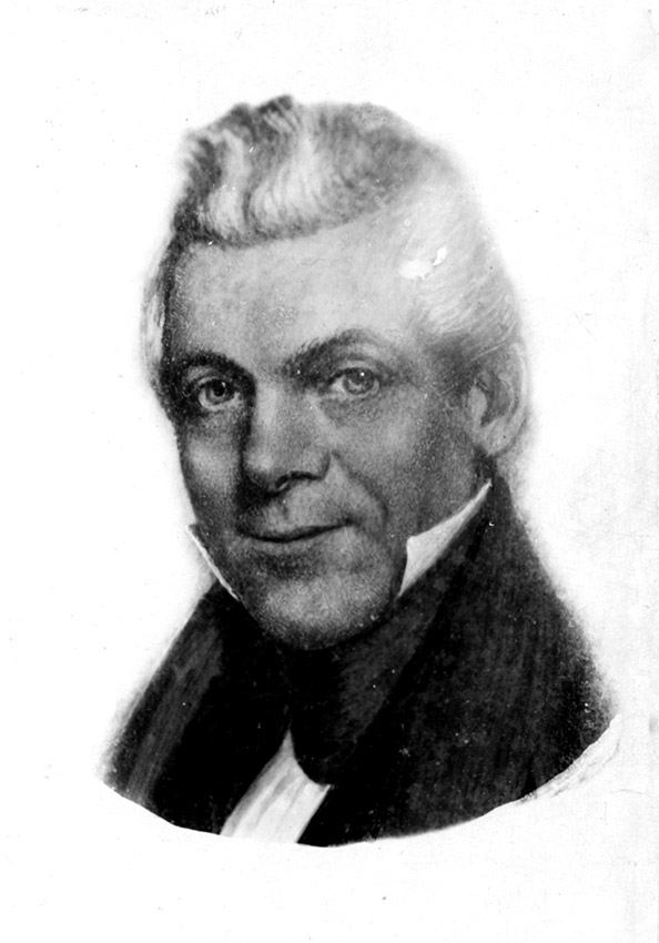Potrait of white man in suit with raised collar