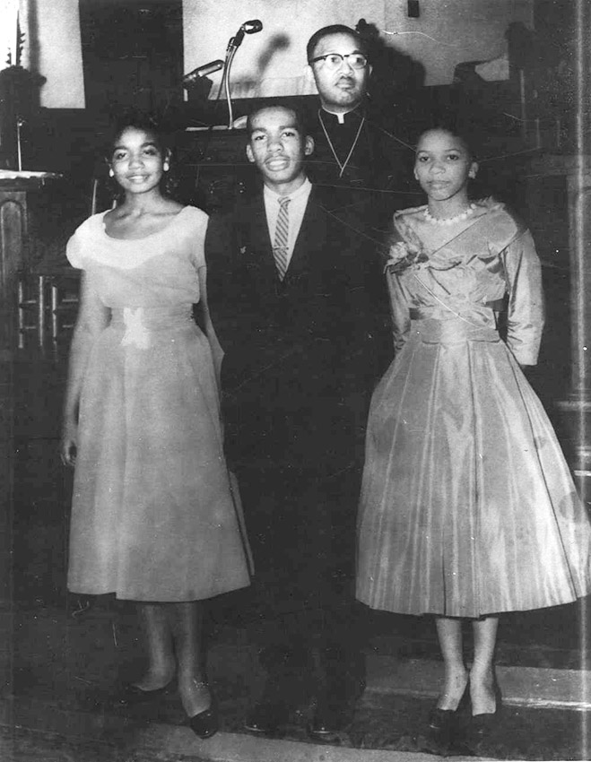 Group of African Americans standing in a church