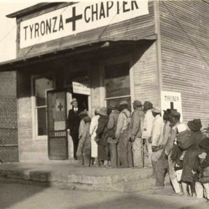 African Americans lined up at "Tyronza Chapter" buildling
