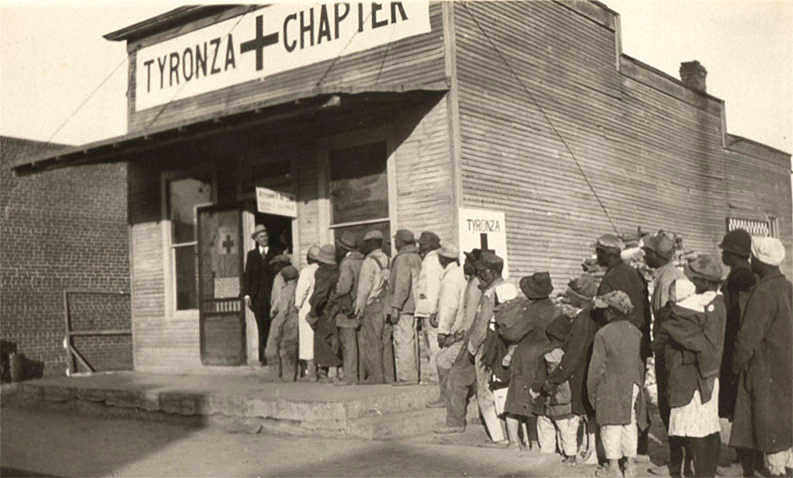 African Americans lined up at "Tyronza Chapter" buildling