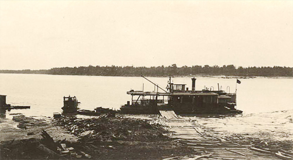 Ferry boat at dock on river